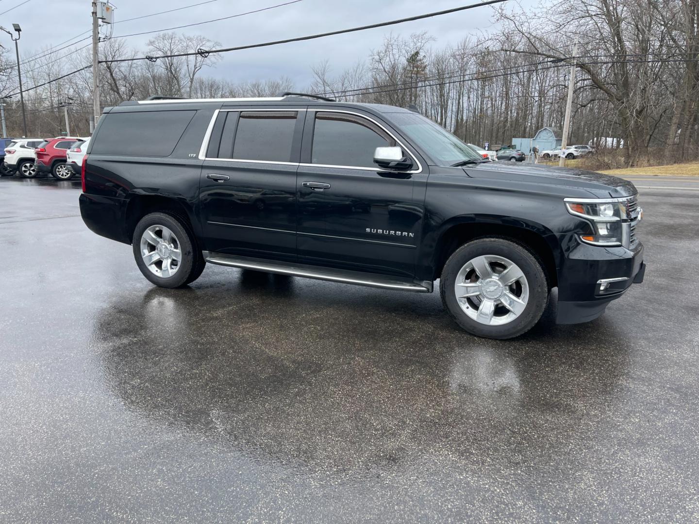 2016 Black /Brown Chevrolet Suburban LTZ 4WD (1GNSKJKC3GR) with an 5.3L V8 OHV 16V engine, 6A transmission, located at 11115 Chardon Rd. , Chardon, OH, 44024, (440) 214-9705, 41.580246, -81.241943 - Photo#3